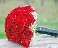 Bridal Flowers Bridal Bouquet of red roses surrounded by gypsophila