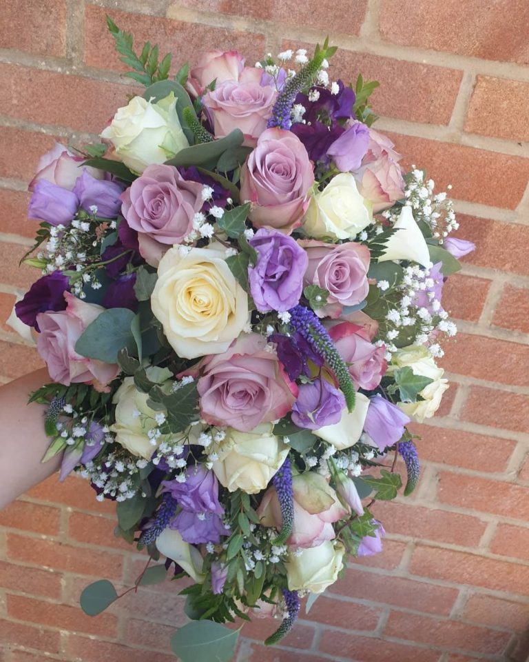 Bridal Bouquets Pink Purple and White Roses with pennygum
