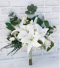 Bride bouquet White lilies and pennygum